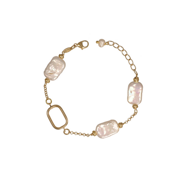 A delicate gold chain bracelet featuring three irregular, pearlescent white baroque-style beads and a large open rectangular gold link.