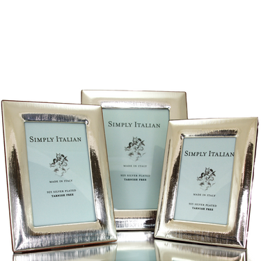Light silver textured frames with wood veneer back, tarnish-free, made in Italy.
