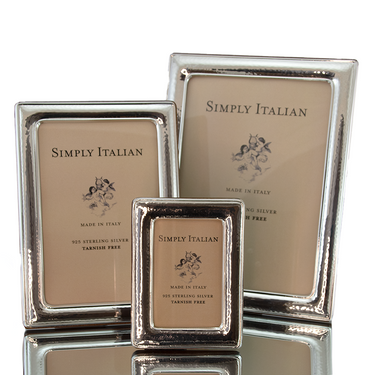 Sterling silver picture frames with a hammered texture and polished wood back. Simply Italian. Made in Italy.