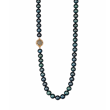 Peacock pearl necklace with a gold and crystal clasp.