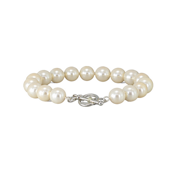 Pearl bracelet with a silver clasp on a white background
