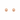 A pair of round rose gold stud earrings on a plain white background.