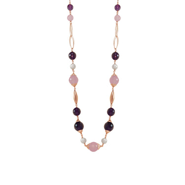 A necklace with alternating purple amethyst and lilac jade beads, interspersed with white freshwater pearls, on a rose gold and sterling silver chain.